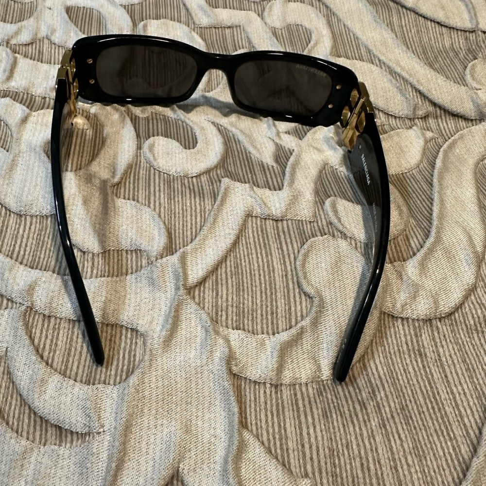Balenciaga Black Sunglasses with Gold Accents - Picture 3 of 9